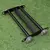 Ham Roller negro para entrenamiento deportivo y musculación, sobre césped sintético