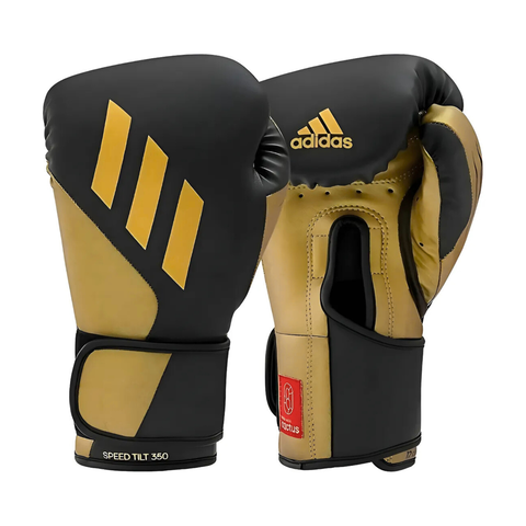 Guantes de boxeo Adidas Tilt 350 en color negro y dorado, mostrando el diseño moderno y logo de la marca.