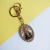 Chaveiro de Nossa Senhora Aparecida com Madre Pérola - comprar online