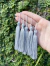 Tassel 70mm em poliéster - Pacote com 5 unidades - Cor Cinza Ref. 012n - comprar online