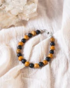 PULSERA HOMBRE ESTABILIDAD CON ÓNIX Y JASPE MADERA - comprar online