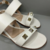 Sandália rasteira flat aplicações piramidais - loja online