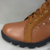 Bota coturno feminina com solado tratorado Marrom caramelo em camurça com detalhes em spike na internet