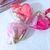 Imagem do Kit com 2 Glosses Glitter Com chaveiro Pompom - Amor Anjo