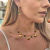 CHOCKER SERENA COM PEDRAS VERDE BANHADO A OURO - comprar online