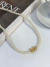 COLAR DE PÉROLAS COM INICIAL BANHADO A OURO 18K na internet