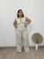 Calça pantalona textura em linho com botões dourado bege