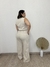 Calça pantalona textura em linho com botões dourado bege na internet