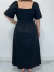 Imagem do Vestido casual Luana com elástico nas costas e mangas com uma fenda discreta preto Luana