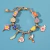 Pulsera Sakura Card Captor tipo Pandora - comprar en línea