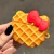 Funda para Airpods de Waffle de Kitty en internet