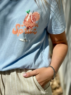 REMERA APEROL CELESTE
