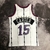 Jersey Toronto Raptors Retro 98/99 Mitchell & Ness Branca, camiseta oficial dos Raptors, camiseta de basquete, camiseta vintage, camiseta retrô, camiseta branca, NBA, time de basquete, uniforme dos Raptors, camiseta de colecionador, camiseta de edição lim