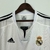 Camisa oficial do Real Madrid, modelo retrô, temporada 03/04, Comemore o título da Champions League com a camisa do Real Madrid, Produto licenciado e de alta qualidade, Garanta sua camisa do Real Madrid na versão retrô, Perfeita para os fãs e colecionador