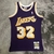 Camisa do Los Angeles Lakers, Edição Retro, Modelo 84/85, Marca Mitchell & Ness, Cor Roxa, Ícone do Basquete, Jersey Oficial, Alta Qualidade, Estilo Clássico, NBA, Time de Los Angeles, Campeões, Uniforme Retrô, Coleção Exclusiva, Design Vintage.