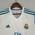 Camisa oficial do Real Madrid, modelo retro 17/18, Produto licenciado pela marca Adidas, Tecido leve e confortável, Design clássico e elegante, Ideal para torcedores e colecionadores, Camisa de alta qualidade, Cores tradicionais do clube, Escudo bordado e