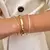 Bracelete liso achatado banhado a ouro 18k