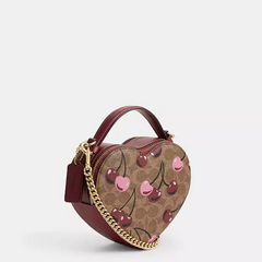 *PREORDEN* Coach Heart Crossbody Bag Canvas Cherry Print en internet