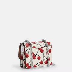 *PREORDEN* Coach Mini Klare Crossbody Bag With Cherry Print en internet