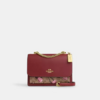 *PREORDEN* Coach Klare Crossbody Bag In Signature Canvas With Cherry Print - comprar en línea