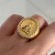 ANEL NOSSA SENHORA OVAL BANHADO OURO 18K