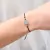 Pulsera Acero Marila (Rojo o Negro)