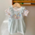 Conjunto Jardineira e Body Peter Rabbit