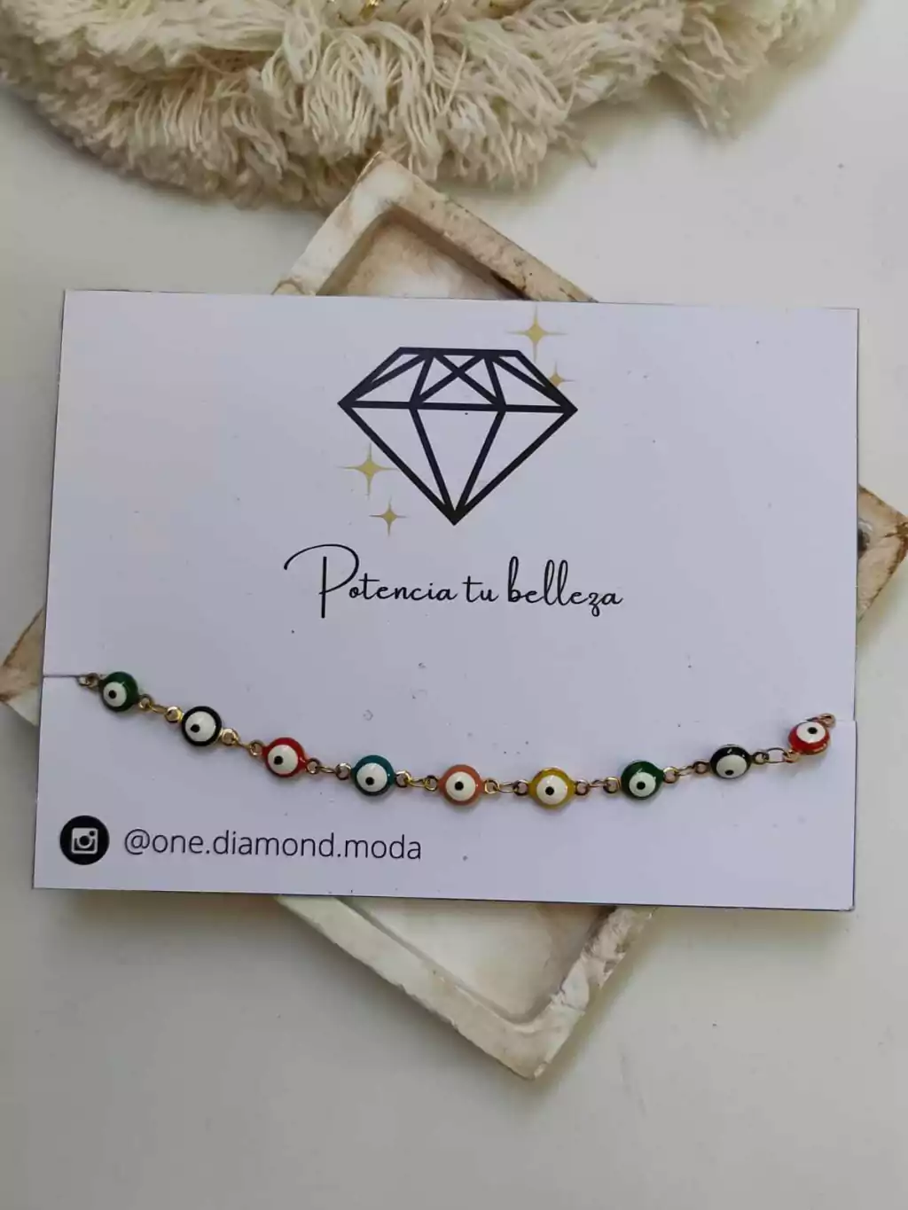 TOBILLERA OJITOS- DORADA