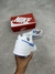 Tênis Nike Ebernon na internet