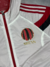 Jaqueta Hino Milan na internet