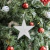 ADORNO DE NAVIDAD ESTRELLA IRIDISCENTE PLATEADO - comprar online