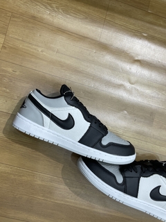 Tênis Air Jordan Low 1 Cinza na internet