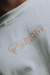REMERA SHOWY EFFERVESCENT CREMA ( SEMIBOXY TEE )