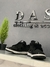 Dunk Low Brilhante Black na internet