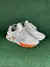 New Balance 997s “Bege e laranja” na internet