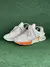 New Balance 997s “Bege e laranja”