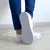Tênis Slipper Cravinhos Branco na internet