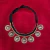 Collar de Botones Waziris Cóncavos en internet