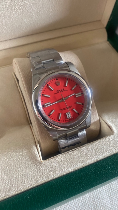 Relógio Rolex oyster perpetual vermelho na Caixa