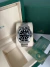 Relógio Rolex Submariner Date preto super clone com pulseira de aço inoxidável, dentro da caixa original verde com certificado, 40 mm no site zarini relogios referencia confiavel na compra e venda de super c, super eta