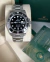 Relógio Rolex Submariner Date preto referencia 126610LN com pulseira de aço inoxidável em caixa de relógio com cartão verde Rolex