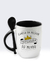 Caneca branca com interior preto e colher, escrita "Caneca da Melhor Professora do Mundo" com uma coroa amarela