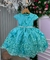 Vestido infantil Marie Jardim Encantado na cor verde Tiffany, com detalhes em renda e aplicação de borboletas em relevo.