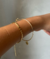 Pulseira Aro 2mm com pingente de inicial banho de ouro - RS STORE | Semijoias Exclusivas e Minimalistas