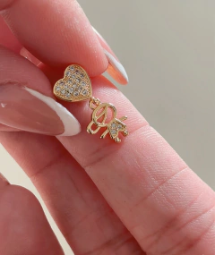 Pingente filho cravejado banho de ouro 18k