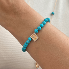 Pulseira Cruz Howlita Turquesa na internet