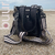 Oval negro con correa larga sublimada nro 1 - llavero plumero - comprar online