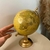 Globo terrestre decorativo com base dourada - comprar online
