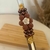 Bomba de chimarrão em Inox com Apliques de perolas - comprar online