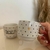 Dupla de xícaras empilhável em porcelana 200ml na internet